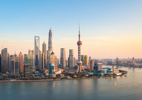 A city skyline with water and buildings

AI-generated content may be incorrect.