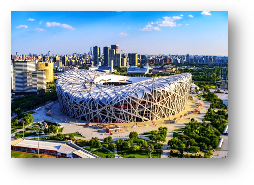 A large white stadium with trees and buildings in the background

AI-generated content may be incorrect.