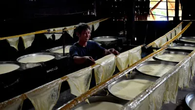 An Binh Islet Tour | A Scenic Mekong River Escape from Can Tho - Inside a traditional tofu skin workshop in Vinh Long, a cultural stop on the Me Kong Smile tour - 18703