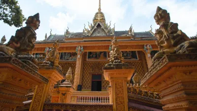 An Binh Islet Tour | A Scenic Mekong River Escape from Can Tho - A close-up shot highlighting the unique and colorful details of Khmer architecture at Phu Ly Pagoda - 18704