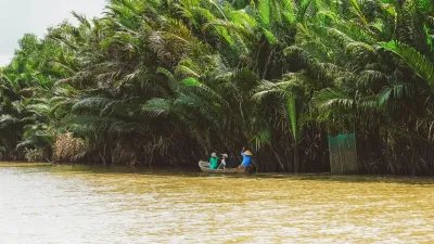 Ben Tre Tour | The Secret of The Coconuts “Capital” - A glimpse of the local life on the river in Ben Tre, with floating houses and boats passing by - 18718